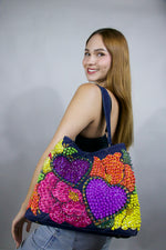 VALENTINA CORAZONES MORADOS FLORES